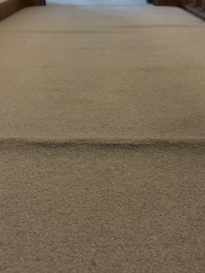Before: 24-year-old carpet with a hump down the middle, Carmel second floor