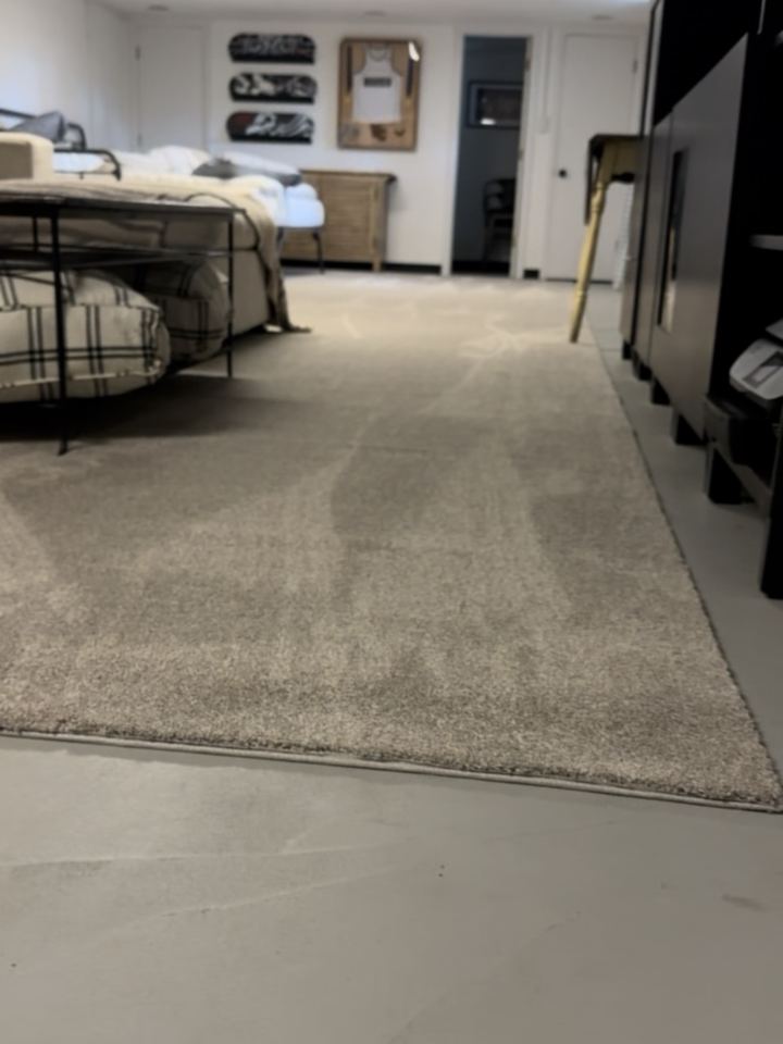 Custom bound rug cut to fit a Carmel basement
