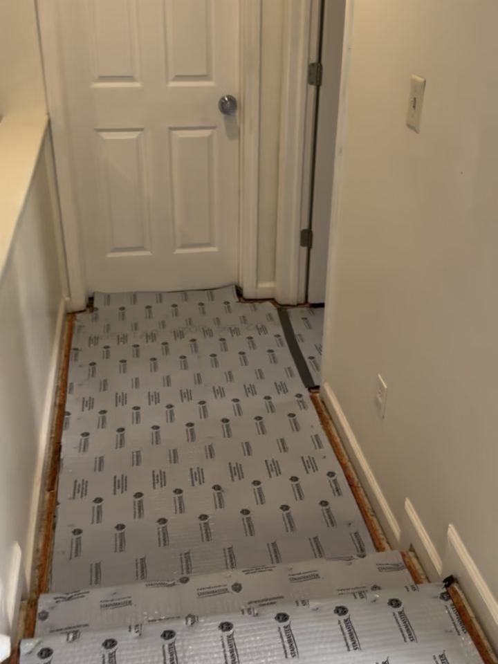 Step 2: pad down, seams taped, never stapled