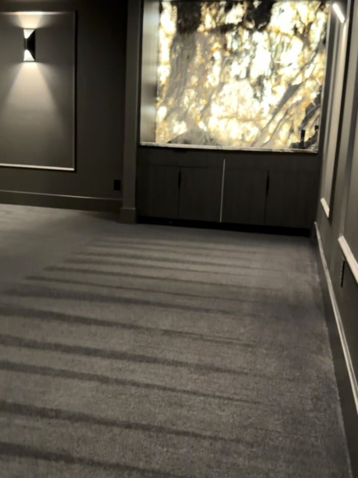 After: finished carpet running up to the backlit onyx bar, Westfield theater